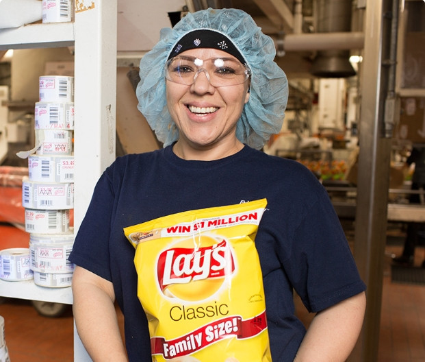 A woman worker smiling at camera
